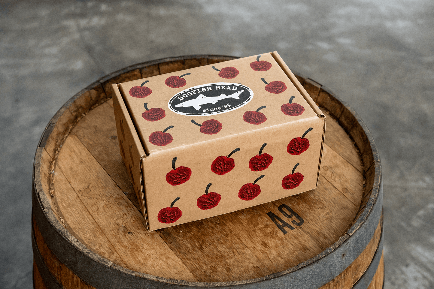 Dogfish Head with cherry design on a wooden barrel
