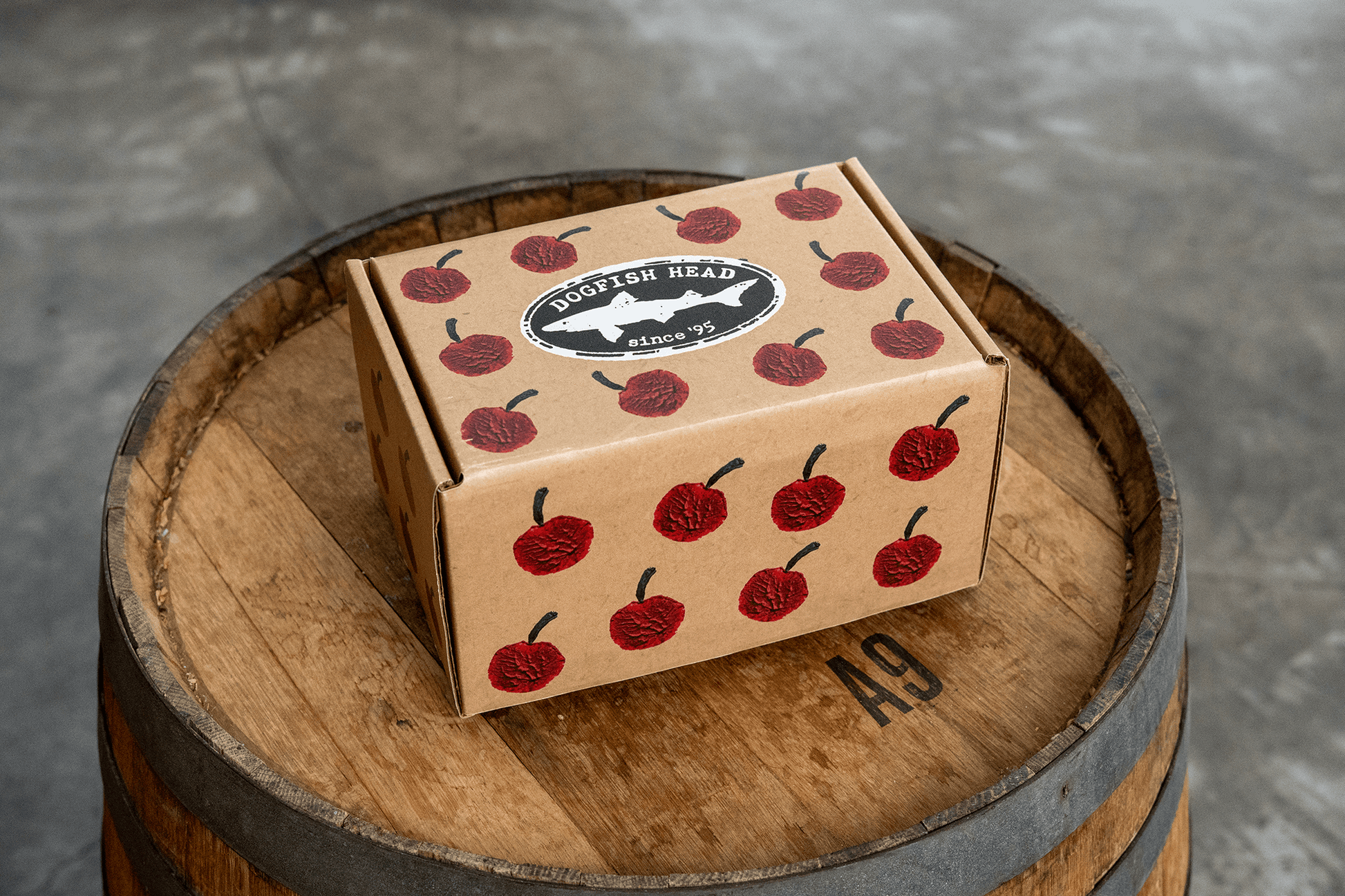 Dogfish Head with cherry design on a wooden barrel