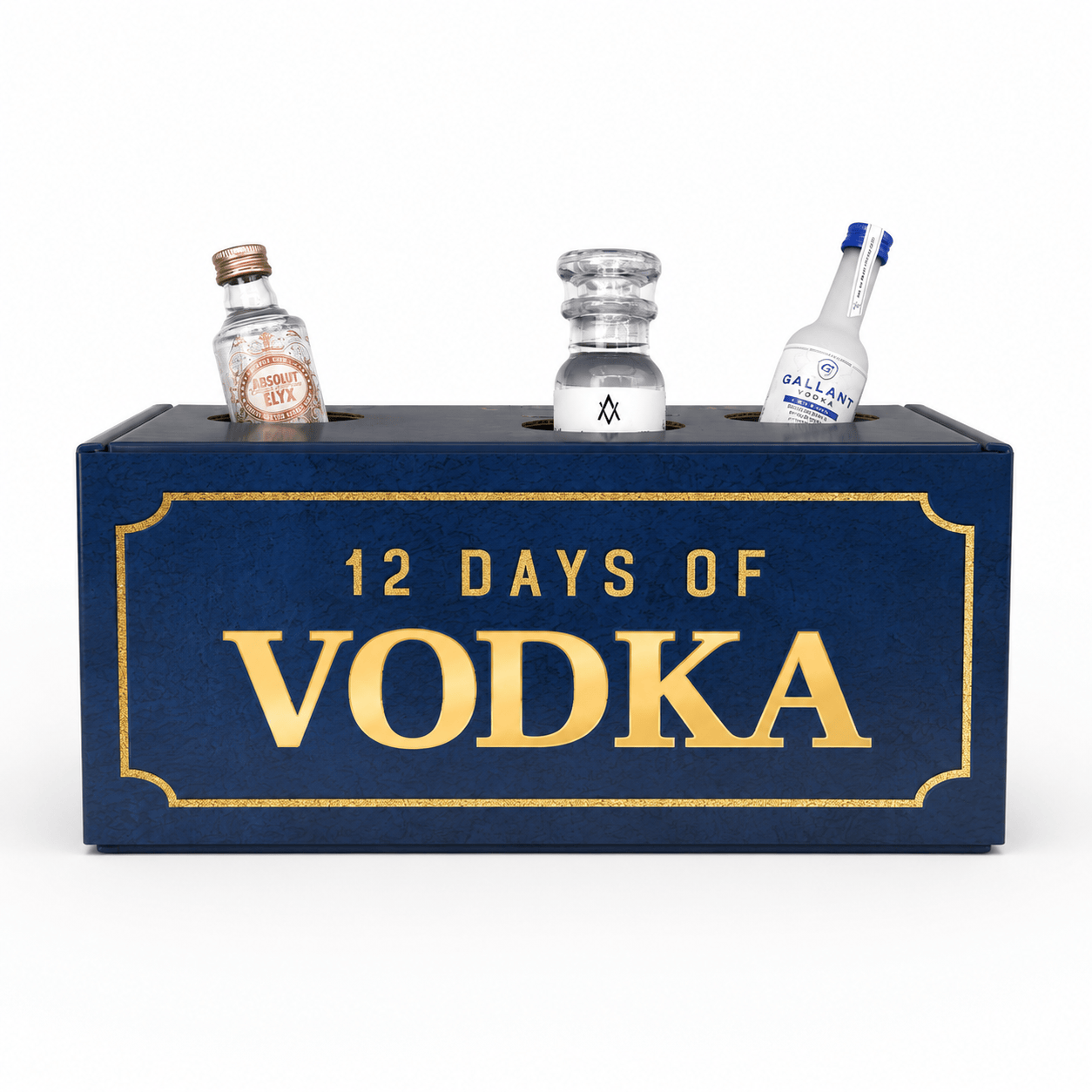 A dark blue rectangular box with gold lettering that reads '12 DAYS OF VODKA,' with three miniature clear bottles inserted into the top. The center bottle is empty, while the left and right bottles are labeled with vodka branding.
