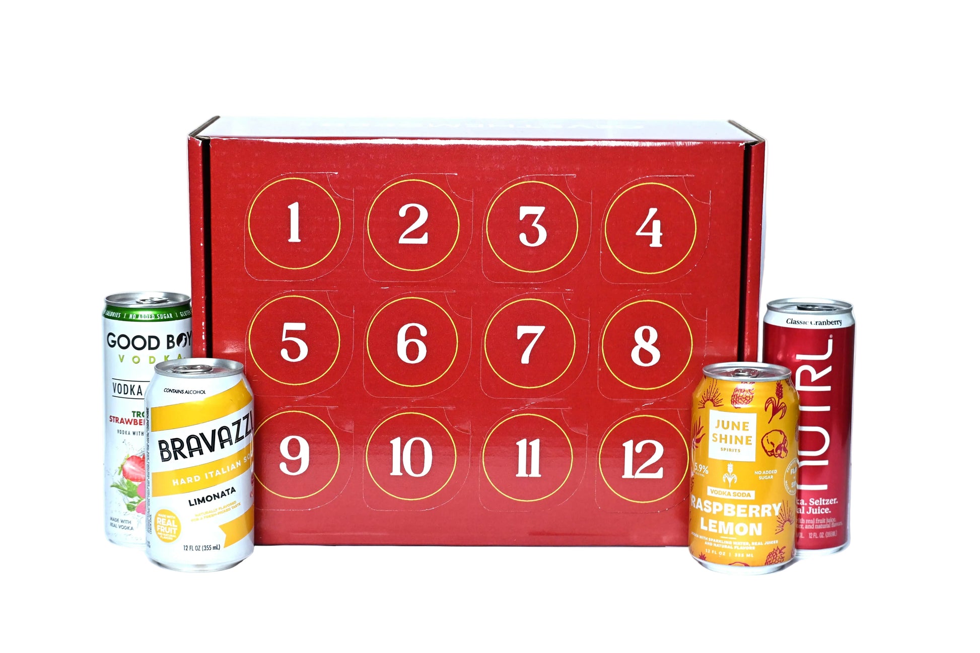 A red beverage advent calendar box with 12 numbered compartments, flanked by four canned drinks on a white background.