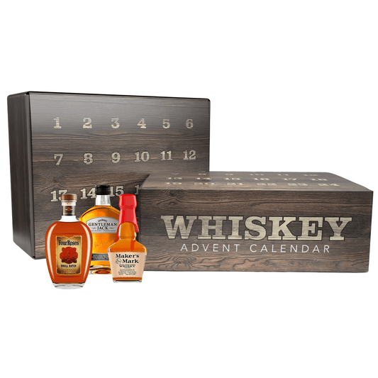 Whiskey advent calendar with bottles in front on a white background